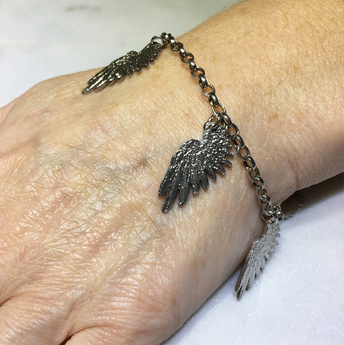 Five Tiny Silver Wings Bracelet