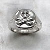 silver skull and crossbones ring detail view